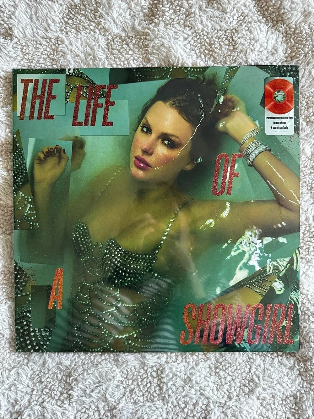 The Life of a Showgirl Portofino Orange Glitter Vinyl Record